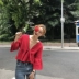 Mùa hè của phụ nữ sexy Hàn Quốc phiên bản của sâu V-Cổ dây đeo áo sơ mi loa bảy điểm tay áo đỏ xù ngắn búp bê áo sơ mi