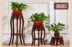 Trung Quốc cổ giả nhựa giả gỗ kệ hoa nhiều lớp phòng khách trong nhà bằng sắt rèn Châu Âu xanh Luo Lan Lan bonsai đặc biệt - Kệ kệ gỗ 3 tầng Kệ