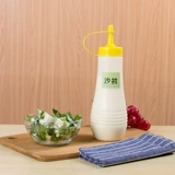 Медовый сжиманный соус бутылка рука рука -бутылка для пирога с бутылкой бутылка бутылка бутылка бутылка бутылка для бутылки бутылка для бутылки с нажима