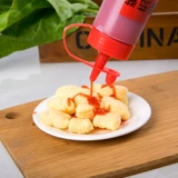 Медовый сжиманный соус бутылка рука рука -бутылка для пирога с бутылкой бутылка бутылка бутылка бутылка бутылка для бутылки бутылка для бутылки с нажима