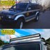 Mitsubishi V31 spotlight V32V33V45 cheetah kim cương đen 2030 lạ soldier 6470 guard bar LED mái ánh sáng đứng Roof Rack