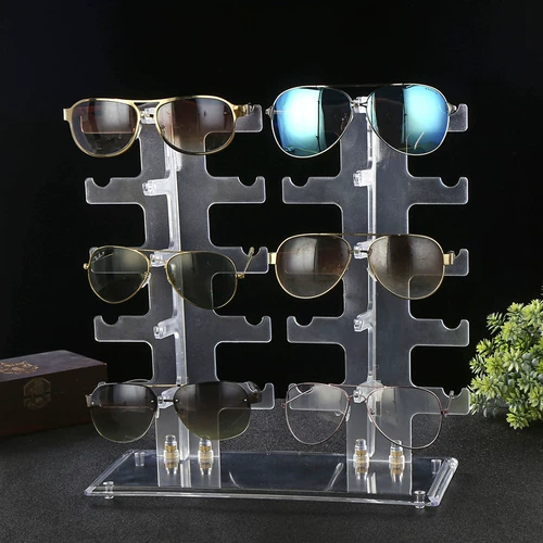 Стенд, солнцезащитные очки, трубка