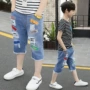 Quần áo trẻ em boy jeans quần short mùa hè 2018 trẻ em mùa hè mới của quần trong trẻ em lớn bảy quần phần mỏng quần vớ bé gái