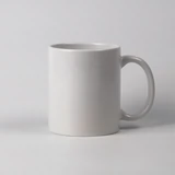 Настройте белую чашку пустой теплопередача керамической рекламной чашки.