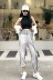 Hong Kong-phong cách retro chic slim treo cổ chữ thập eo vest top + cao eo đa năng quần chân phù hợp với phụ nữ