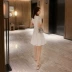 Mùa hè 2020 phiên bản Hàn Quốc ngắn tay trắng cổ chữ V dài giữa váy mới nữ ngọt ngào bong bóng cao eo thêu váy a-line - A-Line Váy