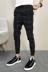 Quần âu nam nhanh màu đỏ người đàn ông kẻ sọc 2018 mới của Hàn Quốc phiên bản của xu hướng Harlan quần chân Mỏng chín điểm mùa hè quần nam phong cách Hàn Quốc Quần Harem
