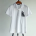 Jingtian với cùng một đoạn đen trắng hai màu cổ điển ve áo động vật thêu sequin cotton ngắn tay áo polo - Áo polo thể thao