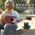 Trẻ em của đồ chơi đàn guitar người mới bắt đầu 23 inch picks âm nhạc có thể chơi chàng trai và cô gái nhập pocket ukulele