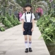 Bé trai cho thấy ăn mặc mùa hè ngắn hoa cô gái nhỏ ăn mặc trẻ em của bib phù hợp với máy chủ đàn piano trang phục
