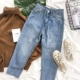 RENA Hàn Quốc mùa thu trắng Harlan phiên bản cao eo là mỏng hoang dã cơ bản đơn giản jeans rách cạnh chín quần quần áo thời trang nữ Quần jean