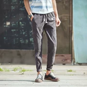 Quần jeans mùa xuân phiên bản Hàn Quốc của xu hướng túi nhỏ đơn giản chân trẻ trung quần nam màu rắn quần giản dị 7102 - Quần jean
