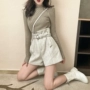 Mùa thu và mùa đông Quần short len ​​mới của phụ nữ Phiên bản Hàn Quốc của chữ A mặc quần len ống rộng chân rộng eo cao quần short da nữ cá tính