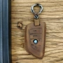 Bộ chìa khóa da ngựa điên được làm bằng da BMW blade 35 series điều khiển từ xa túi da móc chìa khóa xe - Trường hợp chính ví nam da thật