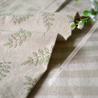 Зеленая листовая печать фон обратной ткани конопли, оранжевый линолен полуотлет.