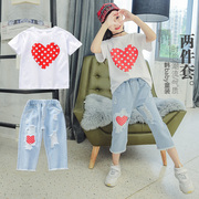 Cô gái phù hợp với Hàn Quốc mùa hè bông tình yêu áo T-Shirt trẻ em lớn lỗ denim cắt quần hai mảnh