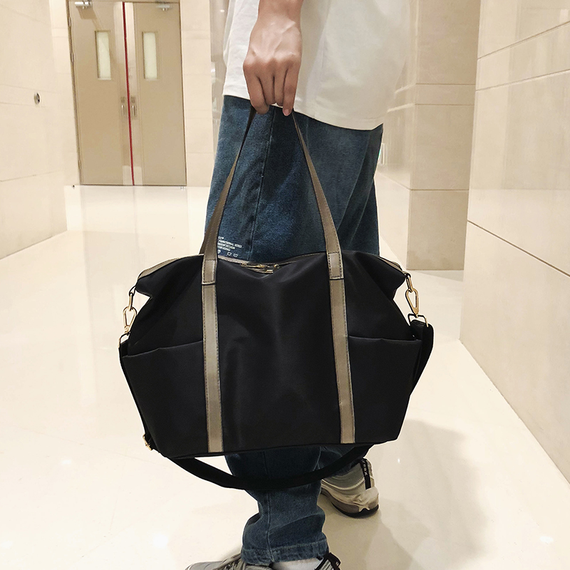 Túi du lịch đơn giản túi xách tay nam du lịch dung lượng lớn không thấm nước nhẹ vai thông thường hành lý túi du lịch - Túi du lịch