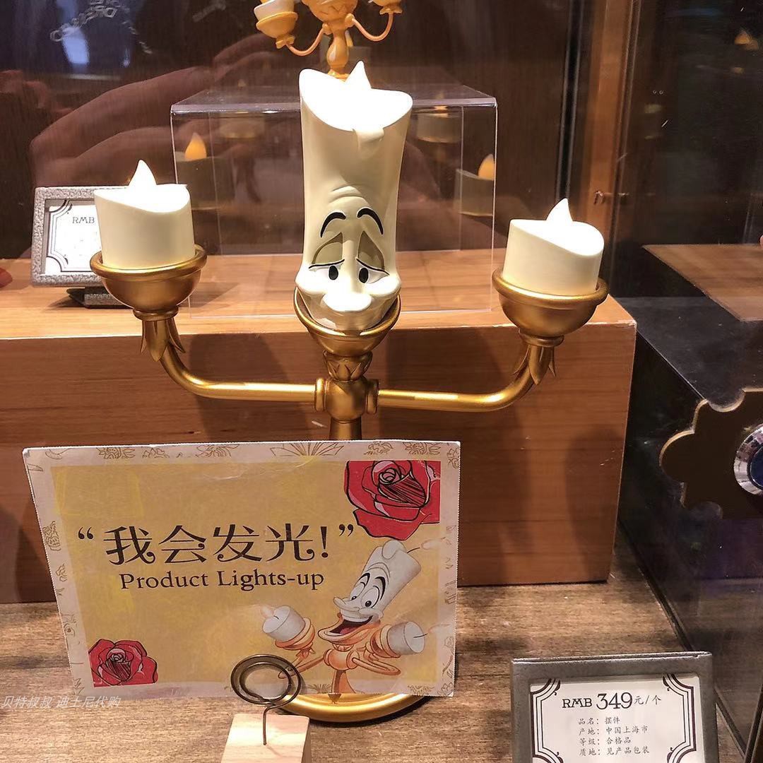 Candlestick LumiaShanghai Disneyland Buy on behalf Beauty and beast Candlestick Lumia  alarm clock Cogsworth  Candle lamp Ornaments Bedside lamp