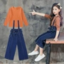 Quần jeans ống rộng cho bé gái yếm hai dây 2018 mùa thu mới cho bé quần rộng phù hợp - Quần jean váy trẻ em