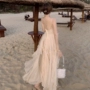 Siêu cổ tích lá sen dây treo váy đi nghỉ lễ Hải Nam Tam Á bên bờ biển váy cổ chữ V eo cao nhẹ nhàng váy cổ tích váy hoa dáng dài