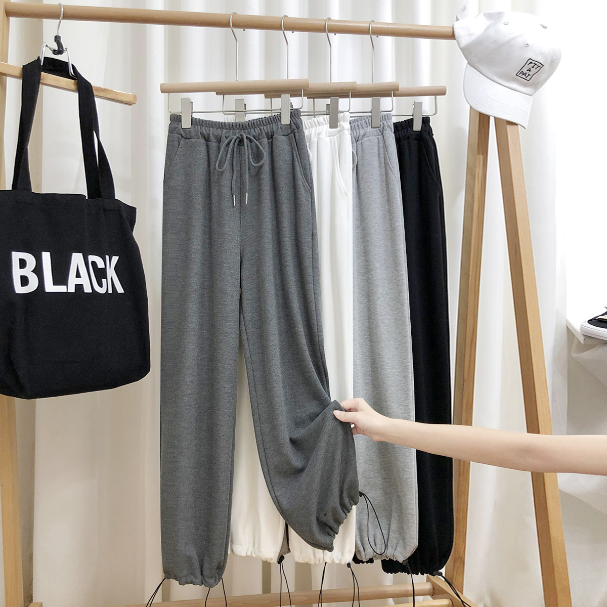 กางเกงสีเทามีสายรัด แฟชั่นฤดูใบไม้ร่วง ใหม่! กางเกงสุภาพสตรีเอวสูงขายาวทรงหัวไชเท้า  灰色抽绳束脚运动裤女秋季新款宽松高腰阔腿休闲萝卜哈伦裤卫裤潮 กางเกงสีเทามีสายรัด แฟชั่นฤดูใบไม้ร่วง ใหม่! กางเกงสุภาพสตรีเอวสูงขายาวทรงหัวไชเท้า 