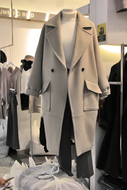 Off-mùa áo khoác nữ áo len trong phần dài của phiên bản Hàn Quốc của tay áo raglan thẳng áo len giải phóng mặt bằng bán phụ nữ triều áo măng tô