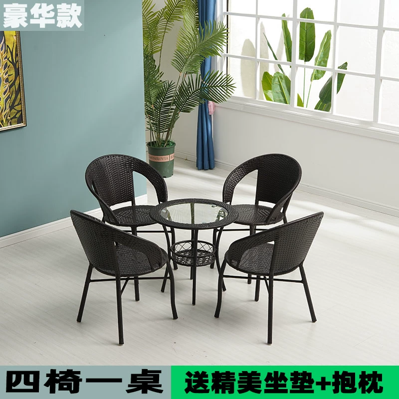 Ghế mây Ningqi bộ ba món bàn cà phê nhỏ ban công bàn ghế nhỏ sân ngoài trời hiện đại đơn giản kết hợp đơn Teng dệt ghế 