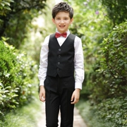 Chàng trai mặc vest vest hoa chàng trai cậu bé chủ nhà vest vest cho thấy trẻ em lớn trang phục piano