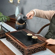 Đen và gỗ mun Wujinshi khay trà hộ gia đình bộ tự động bộ gốm ấm trà kungfu bàn trà gỗ rắn - Trà sứ