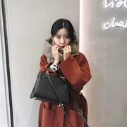 Mùa thu và mùa đông Hàn Quốc phiên bản của dài phù hợp với cổ áo túi lớn len áo khoác nữ trên đầu gối eo eo áo triều