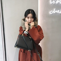Mùa thu và mùa đông Hàn Quốc phiên bản của dài phù hợp với cổ áo túi lớn len áo khoác nữ trên đầu gối eo eo áo triều áo khoác dạ nữ 2020