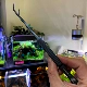 Черный изогнутый пинцет длиной 24,5 см.