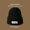 Black patch, knitted hat