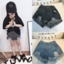 Mùa hè màu tinh khiết 2019 phiên bản mới của Hàn Quốc cho bé gái quần short denim giản dị trong quần lỗ thời trang trẻ em lớn - Quần jean quần sooc bò bé gái