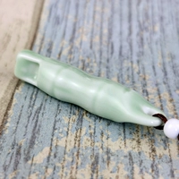 Маленький костный свисток светло -зеленый