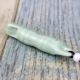 Маленький костный свисток светло -зеленый