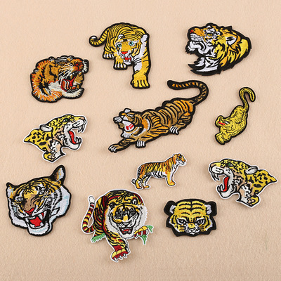 Большая коллекция изящных вышитых наклеек на ткань, нашивок с изображением тигра, украшений в виде животных, отверстий для ремонта одежды, декоративных аппликаций.