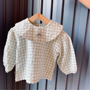 Quần áo trẻ em Hàn Quốc cho bé gái Hàn Quốc 2019 mùa thu mới Phiên bản Hàn Quốc của áo sơ mi cổ áo búp bê cotton dễ thương kẻ sọc - Áo sơ mi
