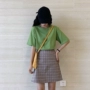 Hanfeng Hồng Kông hương vị chic bơ xanh vòng cổ ngắn tay T-Shirt + kẻ sọc váy nữ tính khí hoang dã phù hợp với mùa hè triều chân váy xòe dài