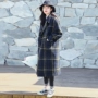 Áo khoác nữ 2018 phổ biến mùa thu đông mới phiên bản Hàn Quốc mới của bộ đồ len mỏng cổ áo hoang dã kẻ sọc dài áo khoác nữ kaki
