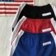 Mỹ retro cao eo là mỏng màu xanh thể thao quần short bên khe hở sọc dọc tập thể dục chạy casual hot quần màu xanh nữ Quần short
