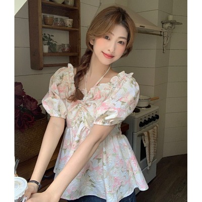 taobao agent Summer large size French unique beautiful bubble sleeve shirt female fat mm covered belly design sense hanging neck floral shirt