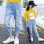 Quần jean nữ mùa hè 2019 phiên bản Hàn Quốc mới của quần lửng trẻ em nước ngoài 9 quần bé gái nhỏ 乞丐 quần 6 lỗ - Quần quần ống rộng cho bé gái