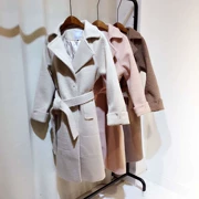 Giải phóng mặt bằng 2017 áo len nữ phần dài Hàn Quốc phiên bản của vành đai eo eo áo len dày lên với cùng một chiếc áo khoác