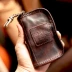 Ami 咔叽 retro thẻ da một túi nam da xe chìa khóa túi lưu trữ túi đa chức năng ví tiền xu - Trường hợp chính Trường hợp chính