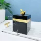 Черная хлопчатобумажная коробка с золотой птицей