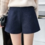 Quần short len ​​mùa thu đông nữ 2018 phiên bản Hàn Quốc mới của quần ống rộng rộng hoang dã đã mỏng một bên ngoài mặc quần bốt quần short nữ ống rộng