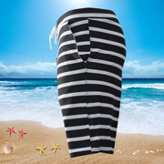 Quần thể thao đi biển lỏng quần nam kích thước lớn lót kỳ nghỉ bên bờ biển năm điểm nóng mùa xuân áo tắm phù hợp với quần short sọc xu hướng - Quần bãi biển