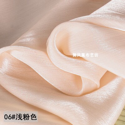 taobao agent Light pink glossy island wrinkled satin texture shirt skirt fabric crystal silk bright surface elegant fabric