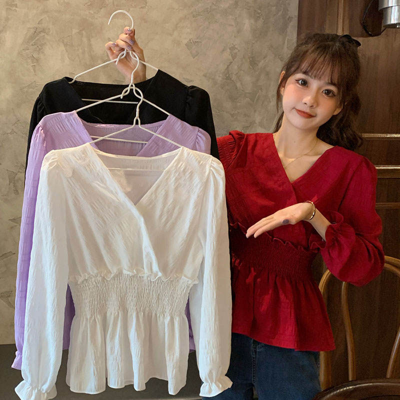 แฟชั่นฤดูใบไม้ร่วง ใหม่ 2020 เสื้อแขนยาวเอวบางบานดอกบัวสไตล์เกาหลี เสื้อคอวี ขนาดฟรีไซส์ 秋装2020新款韩版设计感小众修身荷叶边上衣秋季收腰长袖衬衫女装 แฟชั่นฤดูใบไม้ร่วง ใหม่ 2020 เสื้อแขนยาวเอวบางบานดอกบัวสไตล์เกาหลี เสื้อคอวี ขนาดฟรีไซส์